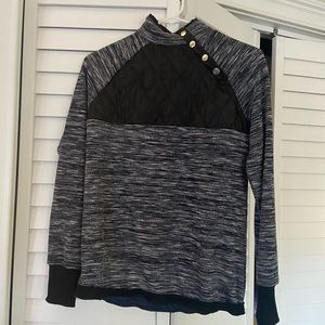 Flattering pullover with snaps
